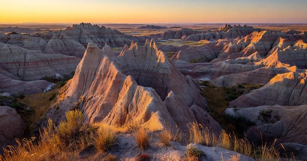 Badlands National Park eroded spires at golden hour, South Dakota