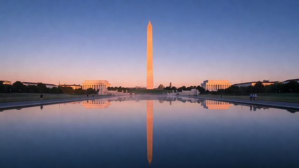 Washington Monument reflected in the Lincoln Memorial Reflecting Pool at dawn