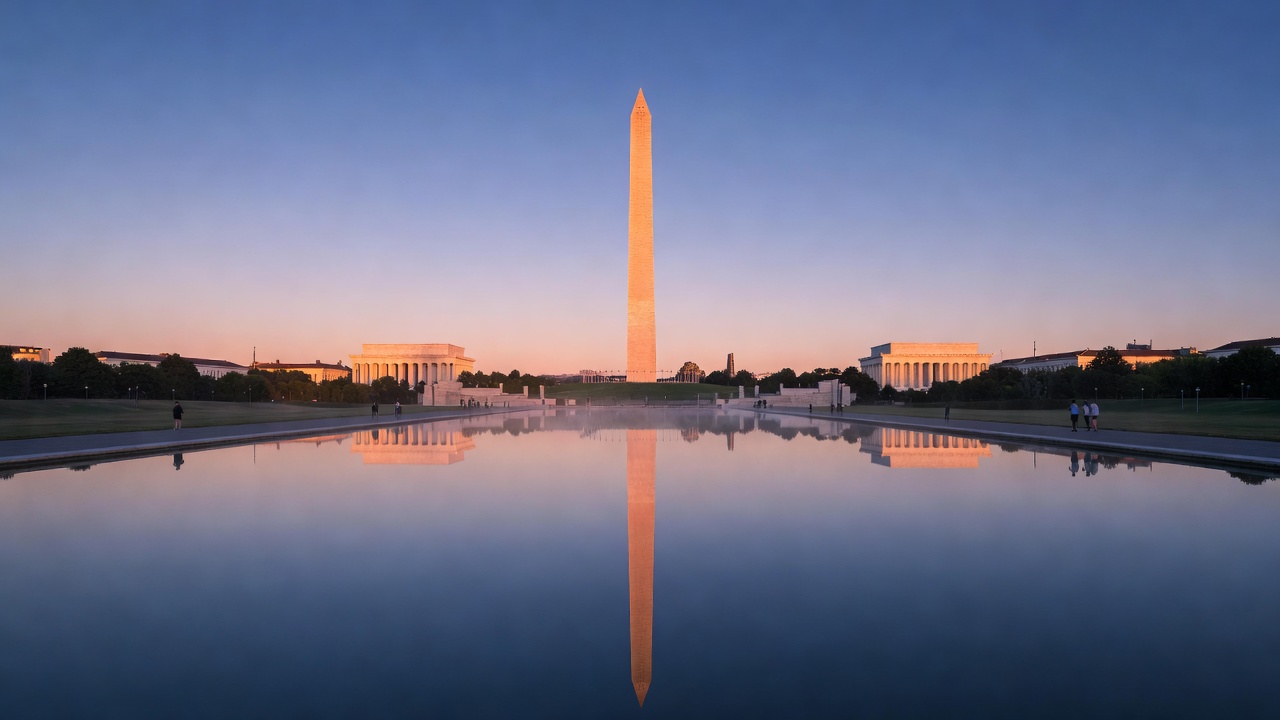 Washington Monument reflected in the Lincoln Memorial Reflecting Pool at dawn